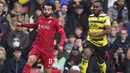 Dua menit berselang giliran Mohamed Salah yang menyumbang gol bagi Liverpool usai menerima umpan dari Roberto Firmino untuk kembali menjauh dari Watford dengan margin 4 gol. (PA via AP/Tess Derry)