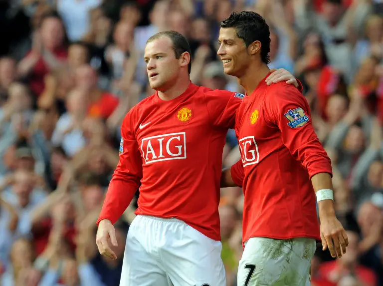 Wayne Rooney dan Cristiano Ronaldo. (AFP/Andrew Yates)