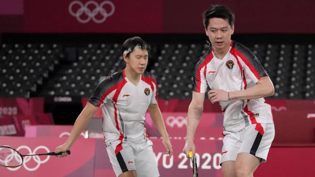 Foto: Angkat Koper dari Olimpiade Tokyo 2020, Pasangan Marcus/Kevin Dipaksa Tunduk oleh Pasangan Malaysia di Babak 16 Besar
