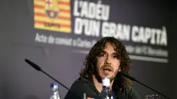 Carles Puyol mengaku, dirinya merasa tertekan tidak dapat kembali bermain maksimal meski telah berkarier selama 15 tahun di Barcelona, (15/5/2014). (AFP PHOTO/Lluis Gene)