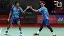 Reaksi pebulu tangkis ganda putra Indonesia Fajar Alfian/Muhammad Rian saat bertanding melawan pebulu tangkis ganda putra Taiwan Chang Ko Chi/Po Li Wei pada babak 16 besar turnamen Daihatsu Indonesia Masters 2023 di Istora Senayan, Jakarta, Kamis (26/1/2023). Fajar/Rian mengalahkan Chang Ko Chi/Po Li Wei dengan skor 13-21, 21-9, dan 21-14. (Liputan6.com/Herman Zakharia)