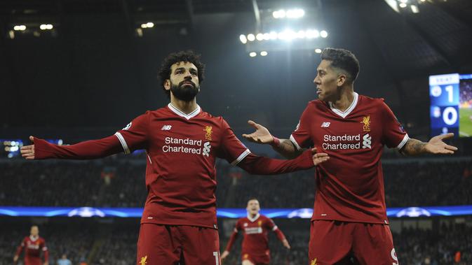 Mohamed Salah dan Roberto Firmino bermain gemilang saat Liverpool menyingkirkan Manchester City. (AP Photo/Rui Vieira)