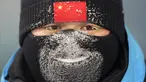 Seorang petugas polisi berjaga-jaga selama final women's aerials Olimpiade Musim Dingin Beijing 2022 di Zhangjiakou, China, pada 14 Februari 2022. (AP Photo/Lee Jin-man)