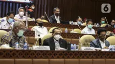 Menteri PUPR Basuki Hadimuljono (kiri), Menteri Perhubungan Budi Karya Sumadi (tengah), dan Mendes PDTT Abdul Halim Iskandar saat rapat kerja membahas Laporan Hasil Pembahasan BPK Semester I dan II/2019 dengan Komisi V DPR di Kompleks Parlemen, Jakarta, Rabu (15/7). (Liputan6.com/Johan Tallo)
