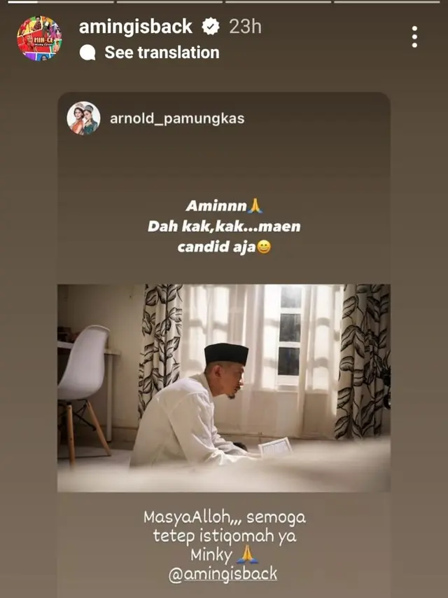 Aming membaca Al Quran