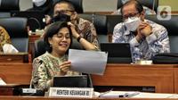 Menteri Keuangan Sri Mulyani saat mengikuti rapat kerja pemerintah dengan Banggar DPR di Kompleks Parlemen, Senayan, Jakarta, Rabu (14/9/2022). Rapat tersebut membahas postur sementara RUU APBN TA 2023. (Liputan6.com/Angga Yuniar)