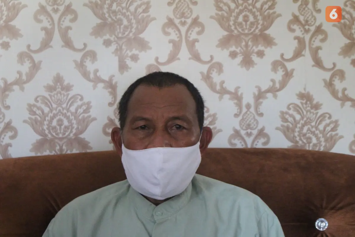 Ahmad Mokambu Warga Kabupaten Bone Bolango yang sembuh dari penyakit usai divaksin Covid-19 (Arfandi Ibrahim/Liputan6.com)