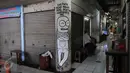 Sebuah lukisan mural di salah satu sudut Pasar PSPT, Tebet, Jakarta (14/11/2015). Keberadaan seni mural di pasar ini bisa membuat pengunjung tersenyum. (Liputan6.com/ Gempur M Surya)