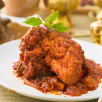 Ilustrasi rendang ayam./Copyright shutterstock.com/id/g/yuliang11