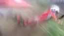 Seorang pemabalap terjatuh saat beraksi di Honda Dream Cup 2025 di Sirkuit Multifungsi Dispora Sumut Jl. Pancing Medan, Minggu (18/5/2025). (Bola.com/M Iqbal Ichsan)