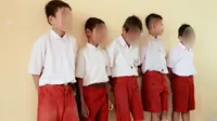 Siswa SD Diduga Dipukuli Gurunya di Indragiri Hilir. (Liputan6.com/M Syukur)