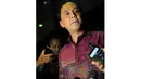 Namun, pria berbaju batik itu enggan memberikan komentar lebih lanjut meski wartawan mencecar dengan berbagai pertanyaaan, Jakarta, Rabu (25/6/14). (Liputan6.com/Faisal R Syam)