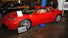 Sebuah mobil Ferrari F430 yang pernah menjadi milik Presiden Donald Trump dipamerkan oleh Auctions America di Florida, 31 Maret 2017. Mobil yang dilelang pada 1 April kemarin itu terjual seharga 270.000 dolar AS atau sekitar Rp3,6 miliar (LEILA MACOR/AFP)