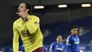 Pemain Burnley, Dwight McNeil, melakukan selebrasi usai mencetak gol ke gawang Everton pada laga Liga Inggris di Stadion Goodison Park, Sabtu (13/3/2021). Burnley menang dengan skor 2-1. (Gareth Copley/Pool via AP)