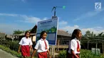 Sejumlah siswa beraktivitas di Desa Kampung Laut Kabupaten Cilacap, Kamis (8/2). CSR Pertamina (RU) IV Cilacap membuat 15 kincir angin di desa ini. (Liputan6.com/JohanTallo)