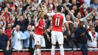 Alexis Sanchez dan Mesut Ozil cetak gol ke gawang MU (Reuters/Liputan6)