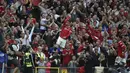 Penyerang Manchester United, Cristiano Ronaldo berselebrasi usai mencetak gol keduanya ke gawang Newcastle United pada pertandingan Liga Inggris di stadion Old Trafford, Sabtu (11/9/2021). Ronaldo mencetak dua gol dan mengantar MU menang atas Newcastle 4-1. (AP Photo/Rui Vieira)