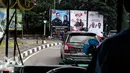 Baliho tiga pasang calon Pilkada DKI 2017terpasang di kawasan Tugu Tani, Jakarta, Minggu  (20/11). KPUD DKI Jakarta mulai memasang baliho berukuran 4 m x 6 m di sejumlah titik di ibu kota dengan total 30 buah baliho. (Liptan6.com/Faizal Fanani)