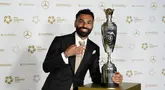 Pemain Liverpool, Mohamed Salah kembali menyabet penghargaan Asosiasi Pemain Profesional (PFA) player of the year musim 2024/2025 untuk ketiga kalinya. (AP Photo/PA/Martin Rickett)