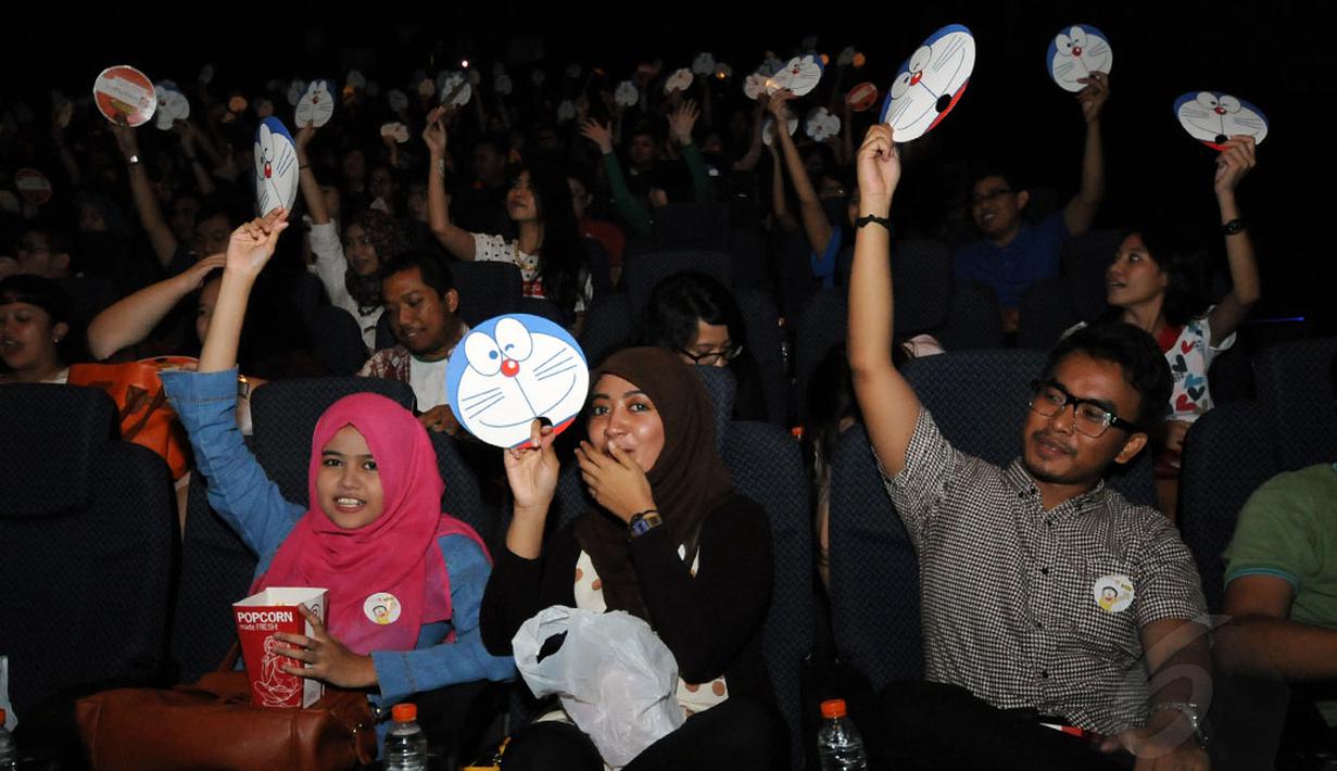 Kemeriahan para Cinemaholic di dalam studio Blitz Megaplex, Grand Indonesia, Jakarta, jelang menyaksikan film Doraemon, (13/12/2014). (Liputan6.com/Helmi Fithriansyah)