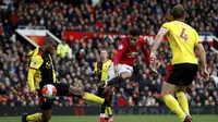 Striker Manchester United (MU) Mason Greenwood mencetak gol melawan Watford pada pekan ke-27 Liga Inggris di Old Trafford, Minggu (23/2/2020). MU menang 3-0. (Martin Rickett / PA via AP)