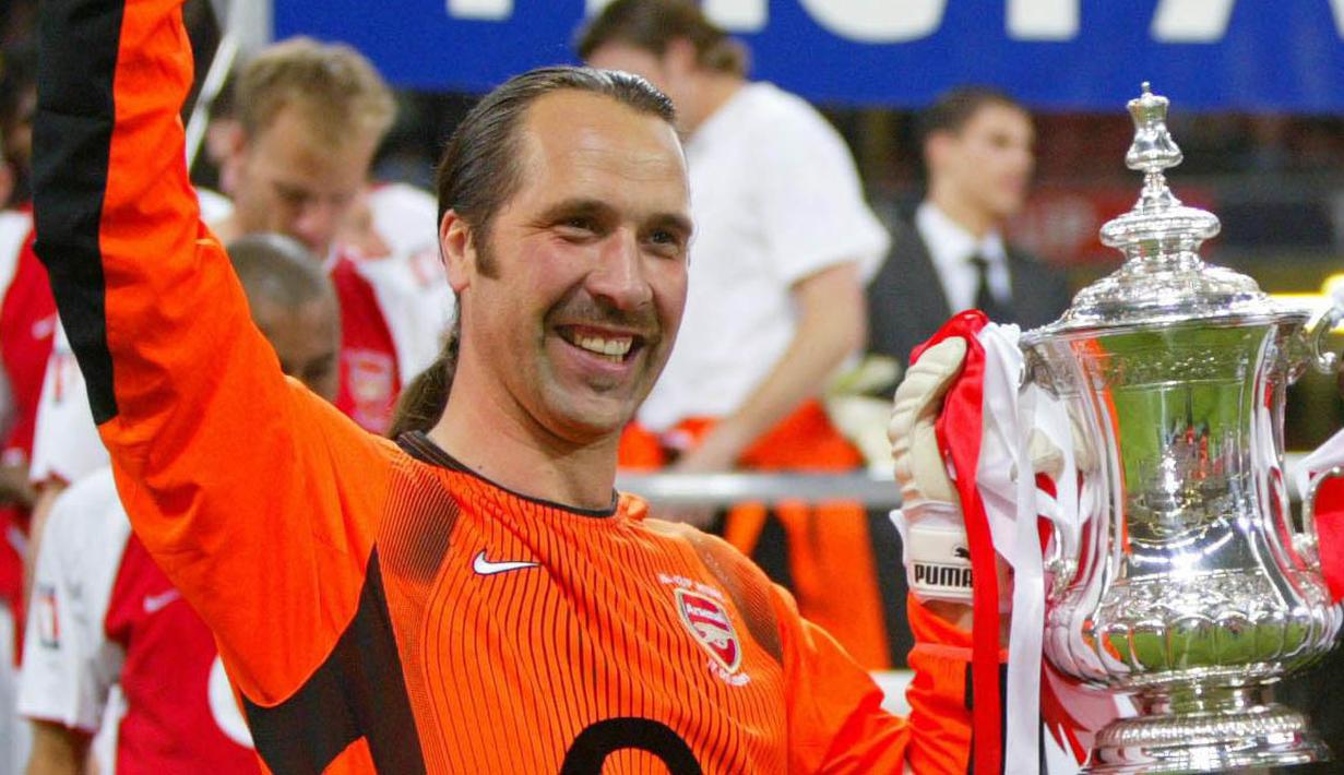 5. David Seaman - Sosok Seaman sangat melekat sebagai kiper terbaik Arsenal sepanjang masa. 13 musim membela Meriam London, Ia sukses menjadi pilihan utama Wenger di bawah mistar gawang. (AFP/Ian Hodgson)