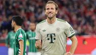 Penyerang Bayern Munich asal Inggris #09, Harry Kane, merayakan gol penalti dalam pertandingan divisi satu Bundesliga Jerman antara Bayern Munich dan Werder Bremen di Munich, Sabtu (27-9-2025) dini hari WIB. (Alexandra BEIER/AFP)