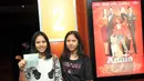 Pemenang kuis terlihat sangat antusias menonton Film ANNIE sambil menunjukkan voucher nonton saat Premier Film ANNIE di Plaza Indonesia XXI, Jakarta, Rabu (21/1/2015). (Liputan6.com/Panji Diksana)