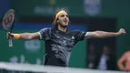 Petenis Yunani, Stefanos Tsitsipas berselebrasi setelah mengalahkan Novak Djokovic dari Serbia pada perempat final tunggal putra tenis Shanghai Masters di Qizhong Forest Sports City Tennis Center di Shanghai, China (11/10/2019). Tsitsipas menang 3-6, 7-5, 6-3 atas Djokovic. (AP Photo/Andy Wong)
