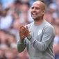 Manajer terbaik Liga Inggris hingga paruh musim 2021/22 bisa dibilang milik Pep Guardiola. Pasalnya, ia mampu mempersembahkan tiga kali gelar juara Liga Inggris dalam kurun empat tahun. The Cityzens juga tengah mengincar gelar keempatnya bersama Pep pada musim ini. (AFP/Oli Scarff)