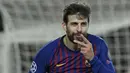 Gerard Pique berhasil mengoleksi empat gelar Liga Champions. Gelar pertamanya ia sabet ketika bermain di Manchester United pada tahun 2008. Tiga gelar lainnya diraih bersama Barcelona di tahun 2009, 2011, dan 2015. (AFP/Lluis Gene)