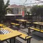 Meja bermain catur di Check, Mate Cafe