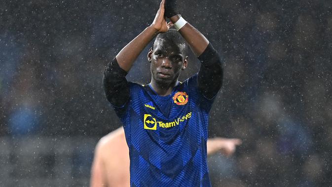 Gelandang Manchester United atau MU Paul Pogba mengucapkan selamat menjalankan ibadah puasa Ramadhan 1443 Hijriah di akun Instagram miliknya. (foto: Paul ELLIS / AFP)