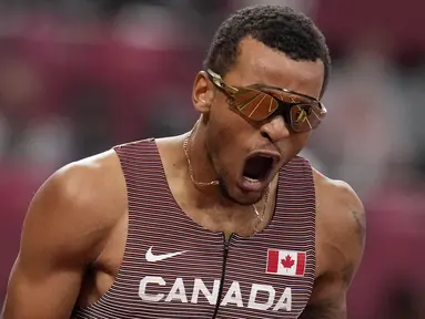 Pensiunnya Usain Bolt di cabang olahraga lari seolah menjadi angin segar bagi sprinter lain, termasuk Andre De Grasse. Benar saja, pelari asal Kanada langsung tunjukkan tajinya di nomor 200 meter putra Olimpiade Tokyo 2020. (Foto: AP/Markus Schreiber)