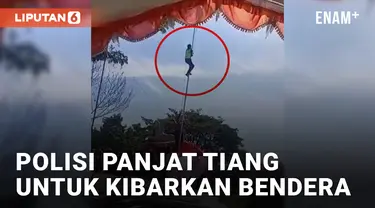 Heroik! Aksi Polisi Panjat Tiang Demi Kibarkan Bendera Merah Putih