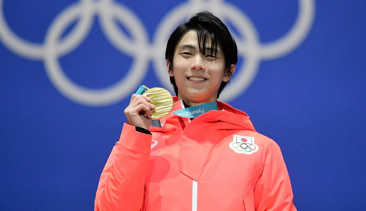 Yuzuru pernah meraih medali emas pada ajang Olimpiade sebanyak dua kali, yaitu saat Olimpiade Musim Dingin Sochi 2014 dan Olimpiade Pyongyang 2018. (AFP/Javier Soriano)