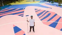 Lapangan Taman Menteng dibalut dengan warna-warni karya seniman mural Stereoflow yang terinspirasi dari semangat kolaborasi dan keberagaman Kota Jakarta. (dok. Mahavisual)
