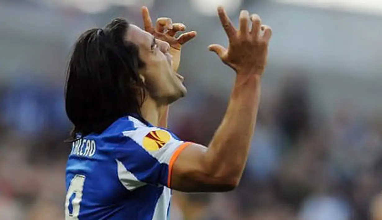 Luapan kegembiraan striker FC Porto Radamel Falcao usai mencetak gol ke gawang Sporting Braga dalam partai final UEFA Europa League di Dublin, Irlandia, 18 Mei 2011. AFP PHOTO/FRANCISCO LEONG