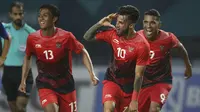 Stefano Lilipaly bersama Febry Haryadi dan Beto berselebrasi usai melakukan gol gol yang luar biasa ke gawang Chinese Taipei. (AP Newsroom)