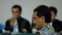 Mantan Menteri Pemuda dan Olahraga ini akan menghadapi sidang dengan agenda pembacaan tuntutan oleh jaksa penuntut umum di Pengadilan Tindak Pidana Korupsi, Jakarta, Senin (30/6/2014) (Liputan6.com/Miftahul Hayat)