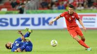 Bek timnas Singapura, Baihakki Khaizan, curhat tak pernah dimainkan di Piala AFF 2016. (AFP/Mohd Fyrol)