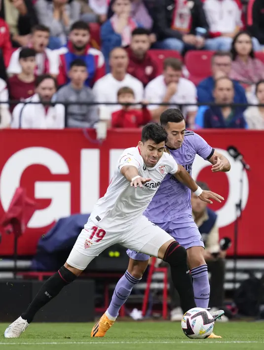 Real Madrid kini berada di posisi kedua klasemen dengan 77 poin. Sedangkan, Sevilla berada di posisi ke-10 dengan 49 poin. (AP Photo/Jose Breton)