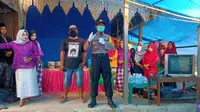Aparat kepolisian membubarkan acara resepsi pernikahan di Desa Adolang Kabupaten Majene