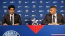 Striker Paris Saint-Germain (PSG) Kylian Mbappe (kanan) dan Presiden PSG Nasser Al-Khelaifi saat konferensi pers di Stadion Paris des Princes, Paris, Prancis, 23 Mei 2022. Keputusan Kylian Mbappe menolak Real Madrid dan berkomitmen untuk PSG selama tiga musim lagi menandai dimulainya proyek pembangunan klub juara Liga Prancis tersebut. (AP Photo/Michel Spingler)