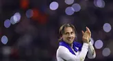 Gelandang Kroasia, Luka Modric melakukan selebrasi setelah memenangkan pertandingan sepak bola leg pertama perempat final UEFA Nations League melawan Prancis di Stadion Poljud di Split, pada 20 Maret 2025. (FRANCK FIFE/AFP)
