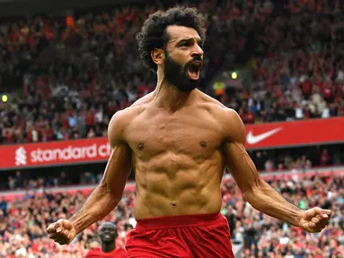 Satu gol ke gawang Watford pada Sabtu, (16/10/2021), membuat Mohamed Salah dinobatkan sebagai pemain Afrika tertajam di Liga Inggris bersanding dengan Didier Drogba. Bedanya, Salah mampu mencetak 104 dalam 166 laga sedangkan Droba meraih jumlah gol tersebut dalam 254 pertandingan. (AFP/Paul Ellis)