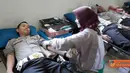 Citizen6, Kendal: Jajaran Polres Kendal dan Yayasan Kemala Bhayangkari menggelar kegiatan sosial menyambut HUT Bhayangkara ke-65, Selasa (21/6). (Pengirim: Aryo Widiyanto)