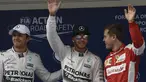 Lewis Hamilton (tengah) tampil tercepat di sesi kualifikasi GP China yang berlangsung di Sirkuit Internasional Shanghai, Sabtu (11/4/2015) sore WIB.(AFP PHOTO/FRED DUFOUR)