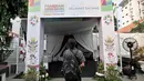 Pengunjung berjalan memasuki pameran Asian Games di Museum Fatahillah, Kota Tua, Jakarta, Selasa (14/8). (Merdeka.com/Iqbal Nugroho)