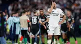 Ekspresi gelandang Real Madrid asal Inggris, Jude Bellingham pada akhir pertandingan leg kedua perempat final Liga Champions 2024/2025 melawan Arsenal di Stadion Santiago Bernabeu, Madrid, Spanyol, 16 April 2025 atau Kamis 17 April 2025 dini hari WIB. (OSCAR DEL POZO/AFP)